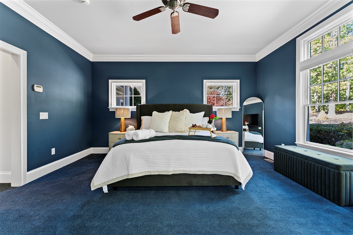 Rest easy in the first bedroom—bright, spacious, and made for slow mornings.
