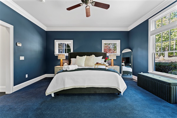 Rest easy in the first bedroom—bright, spacious, and made for slow mornings.