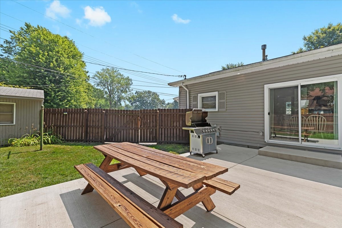 Backyard patio with picnic table for outdoor dining
