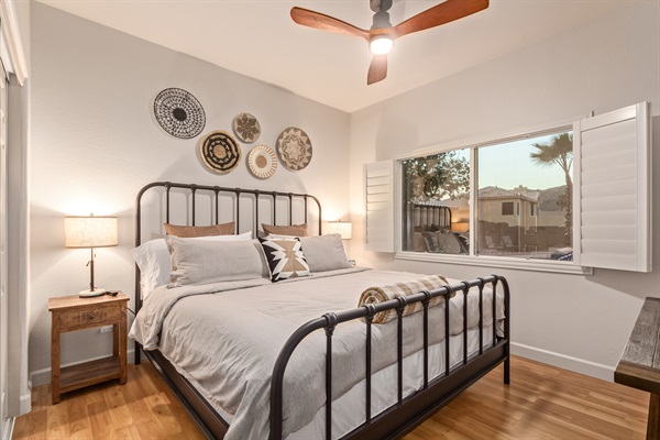 Main floor king bedroom no stairs required, plus a 55" smart TV, linens, extra pillow and blankets, ceiling fan and room darkening shades 