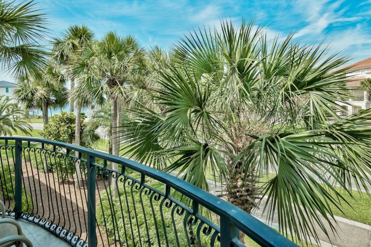 Primary suite with private side balcony and Gulf views