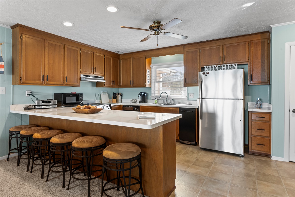 Kitchen: Bright and spacious, perfect for culinary adventures with family and friends!