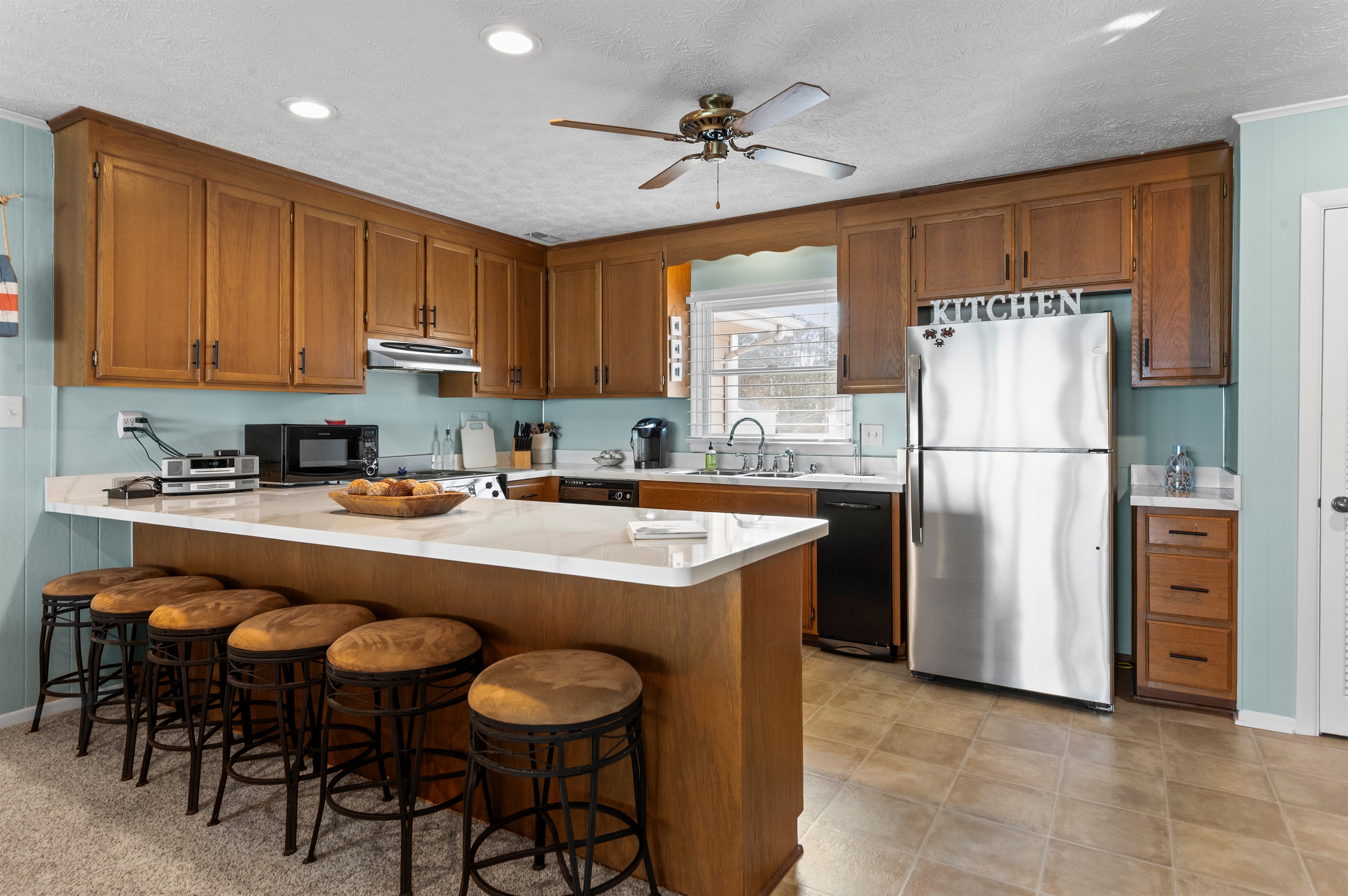 Kitchen: Bright and spacious, perfect for culinary adventures with family and friends!