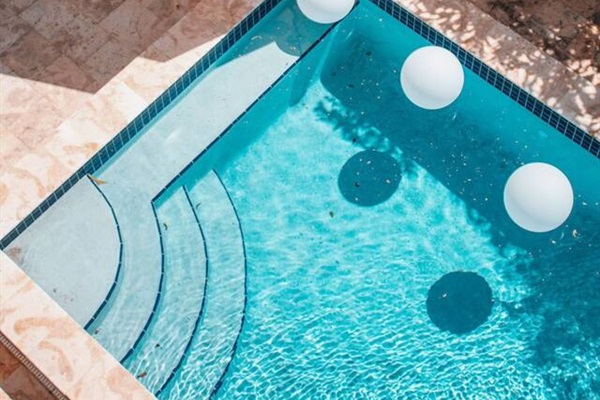 This pool deck with amazing breezes off the harbor, will be your favorite place to hang.