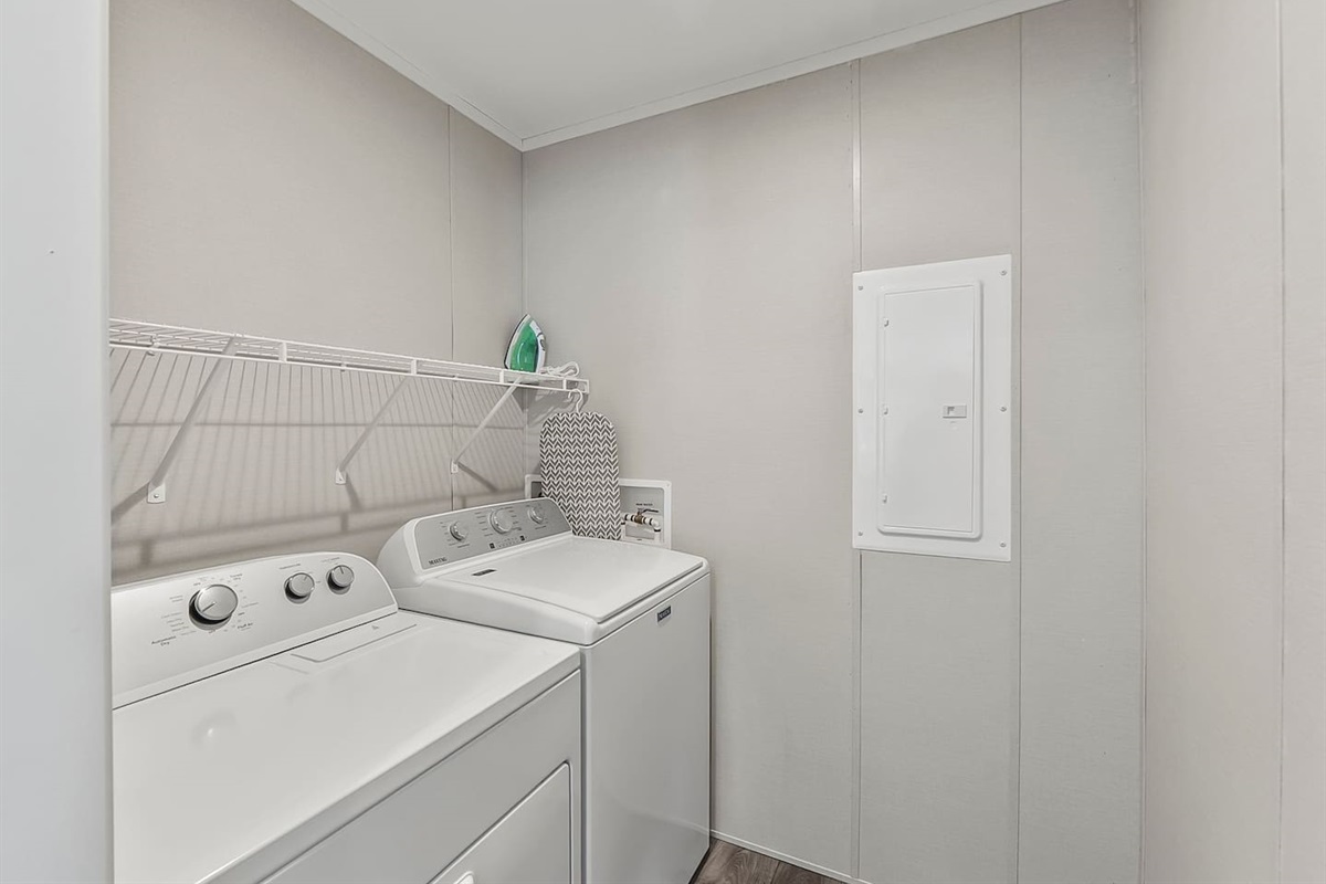 Dedicated laundry area with washer and dryer, making longer stays easy and convenient.