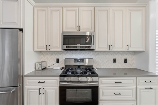 Kitchen with Gas Range and Microwave