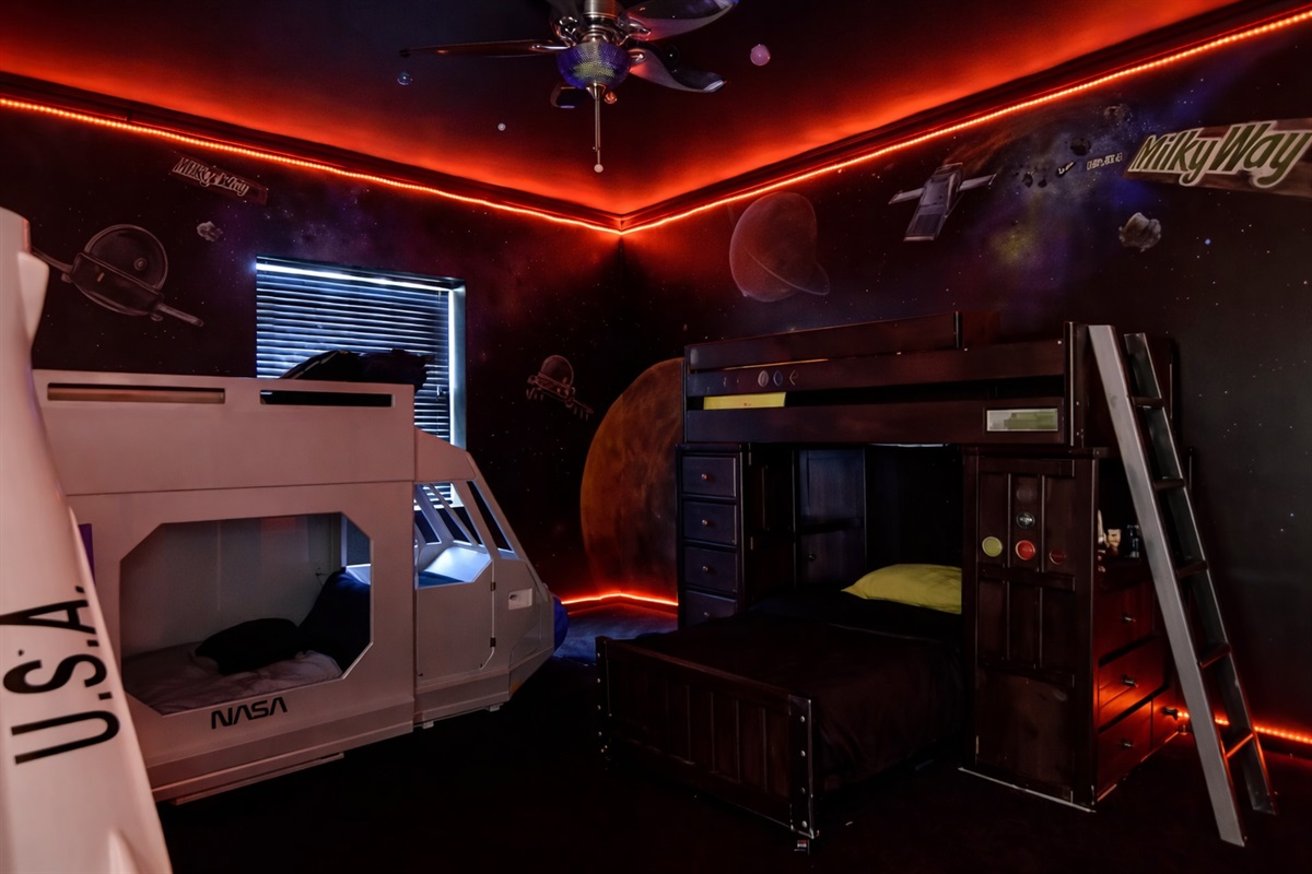 Milky Way galaxy Bed room doubles an interactive laser tag room!