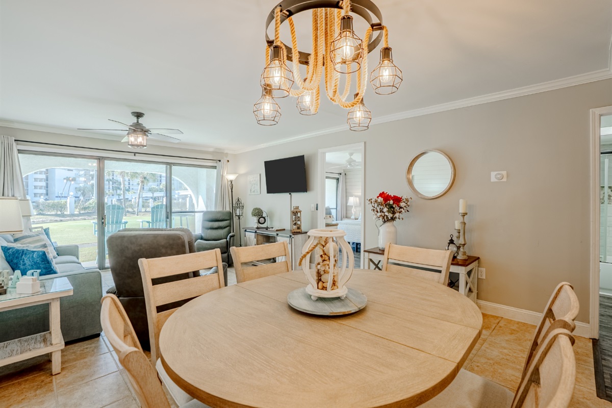 New, six-person dining table with cushioned seats