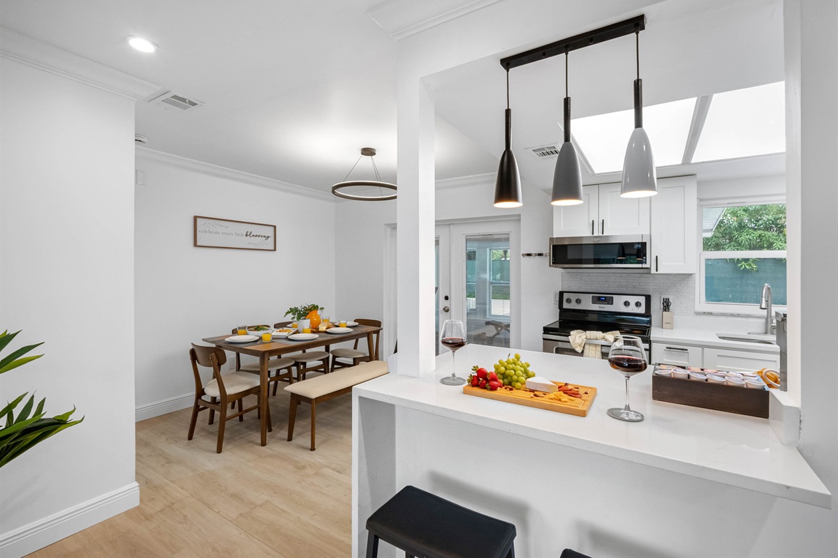 Enjoy the ease and performance of updated stainless steel appliances—including a full-size fridge and glass cooktop.