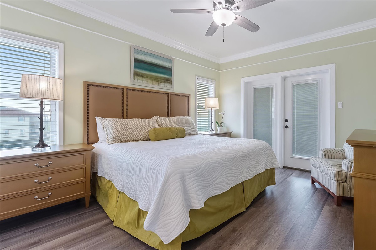 Master Bedroom #2: With king bed, club chair, and deck access.