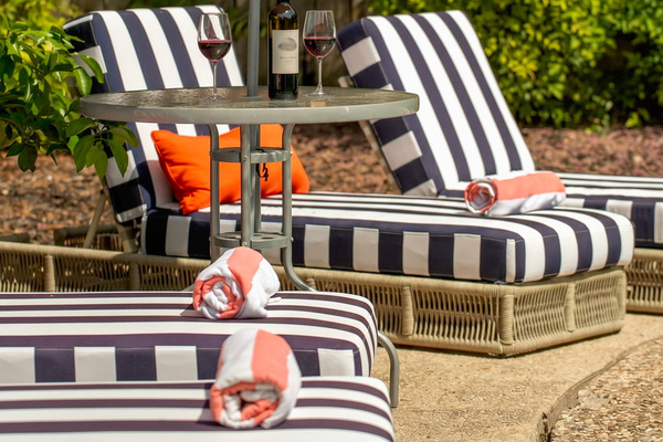 Lounge by the pool with your favorite book or refreshing drink in hand.