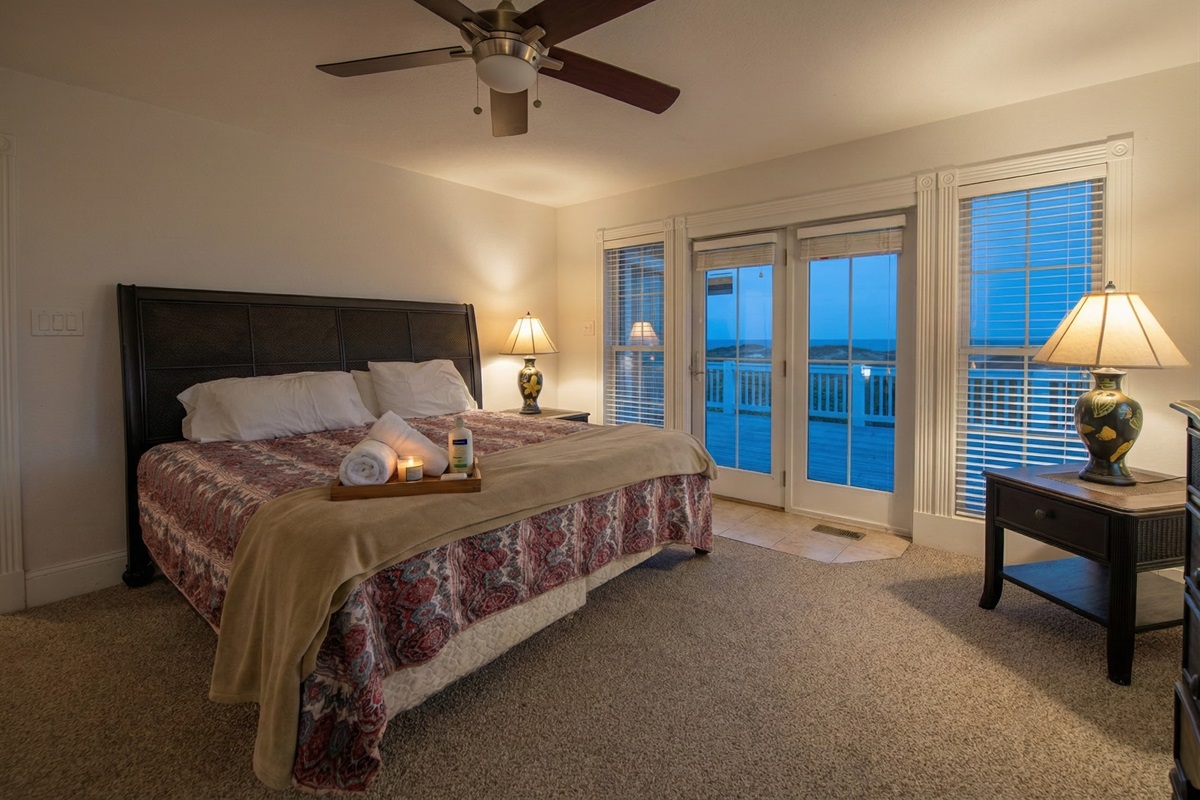 Enjoy all the wonders of The Hemingway's master bedroom while taking in the sights and sounds of the Outer Banks. Take a step out onto the private deck and experience nature first-hand. A perf