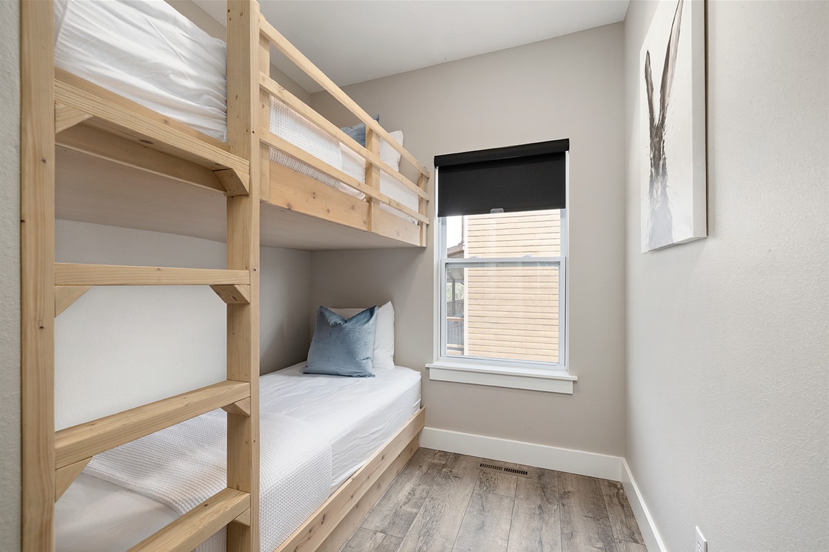 Main level bunk room with 4 twin beds