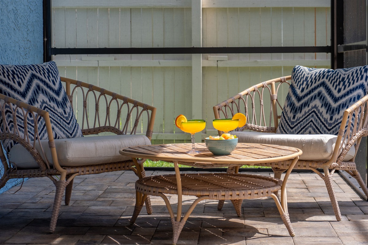 With multiple seating areas, pool games, and a spacious screened enclosure, this outdoor space is ideal for gatherings, grilling, or peaceful solo lounging.