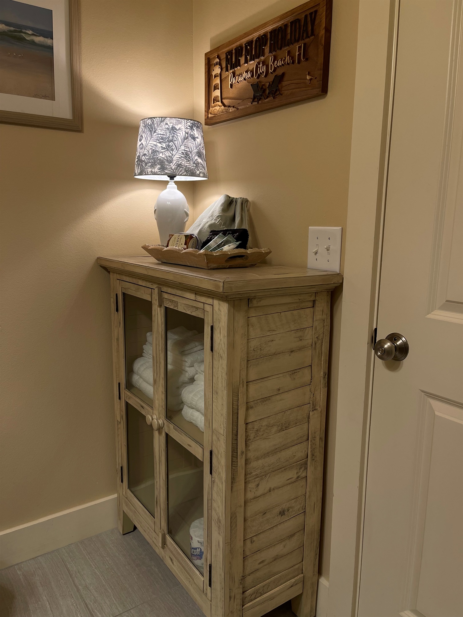 Bath room 3# downstairs features large walk in shower.  Cabinet with homey lamp added 2026.