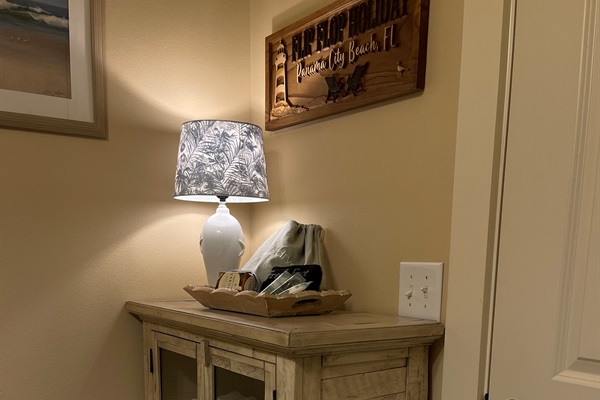 Bathroom #3 downstairs features large walk in shower.  Cabinet with homey lamp added 2026.