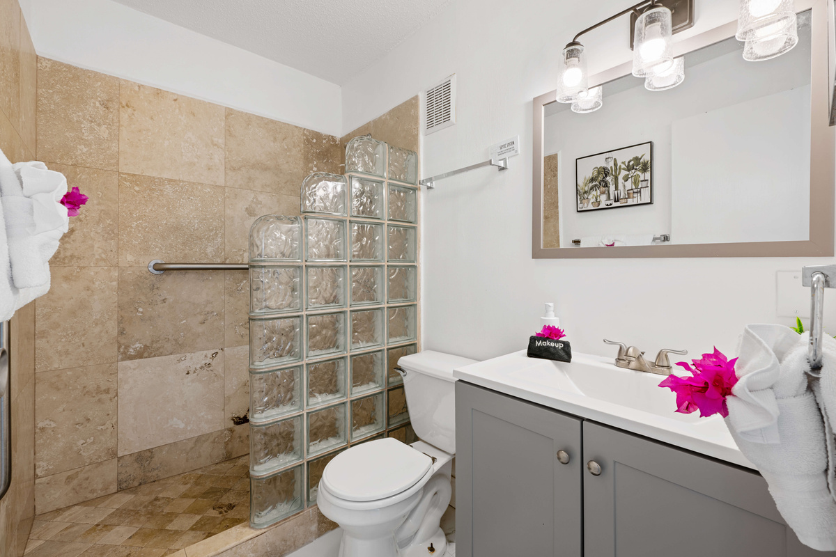 A bright, modern ensuite bathroom with stylish finishes and plenty of space.