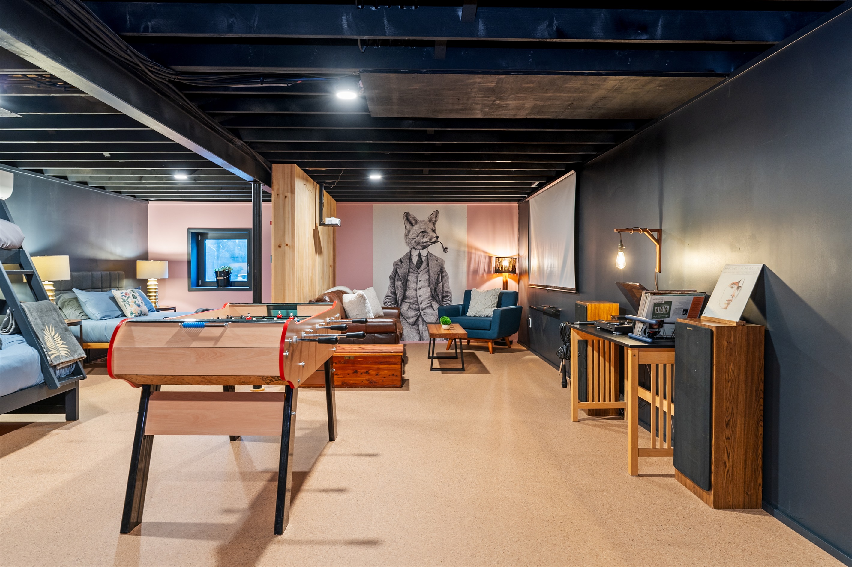 Open recreation room combining comfort and fun, designed for memorable cabin stays.