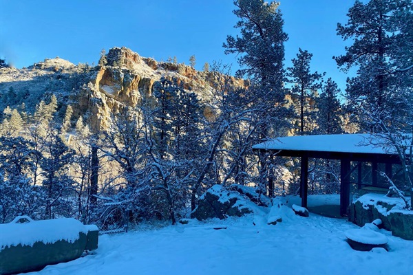 View of the backyard and rock formations from the master bedroom window.