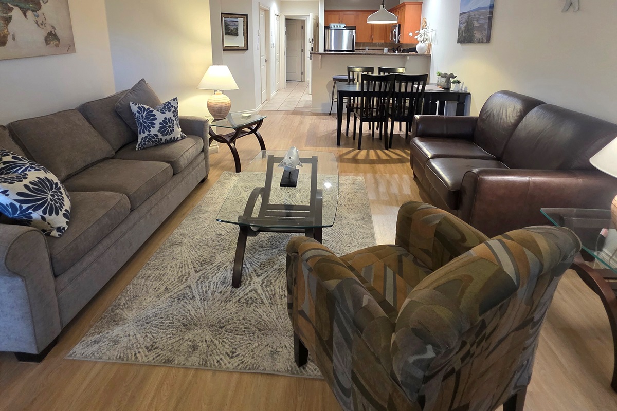 Unit A. The view from executive living room thru kitchen with queen sofa pull out sofa.