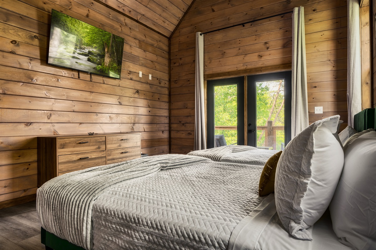 Bedroom 5 :2 Queen beds on second floor with 58 inch Roku HDTV with en suite full bathroom and private deck