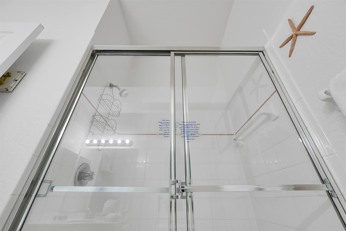 Guest queen bedroom bathroom with walk in shower