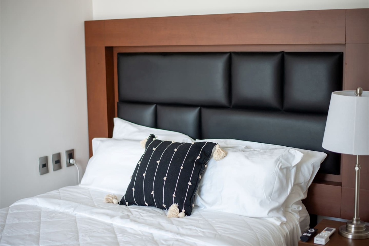 Queen bed in master bedroom with pullout couch 
