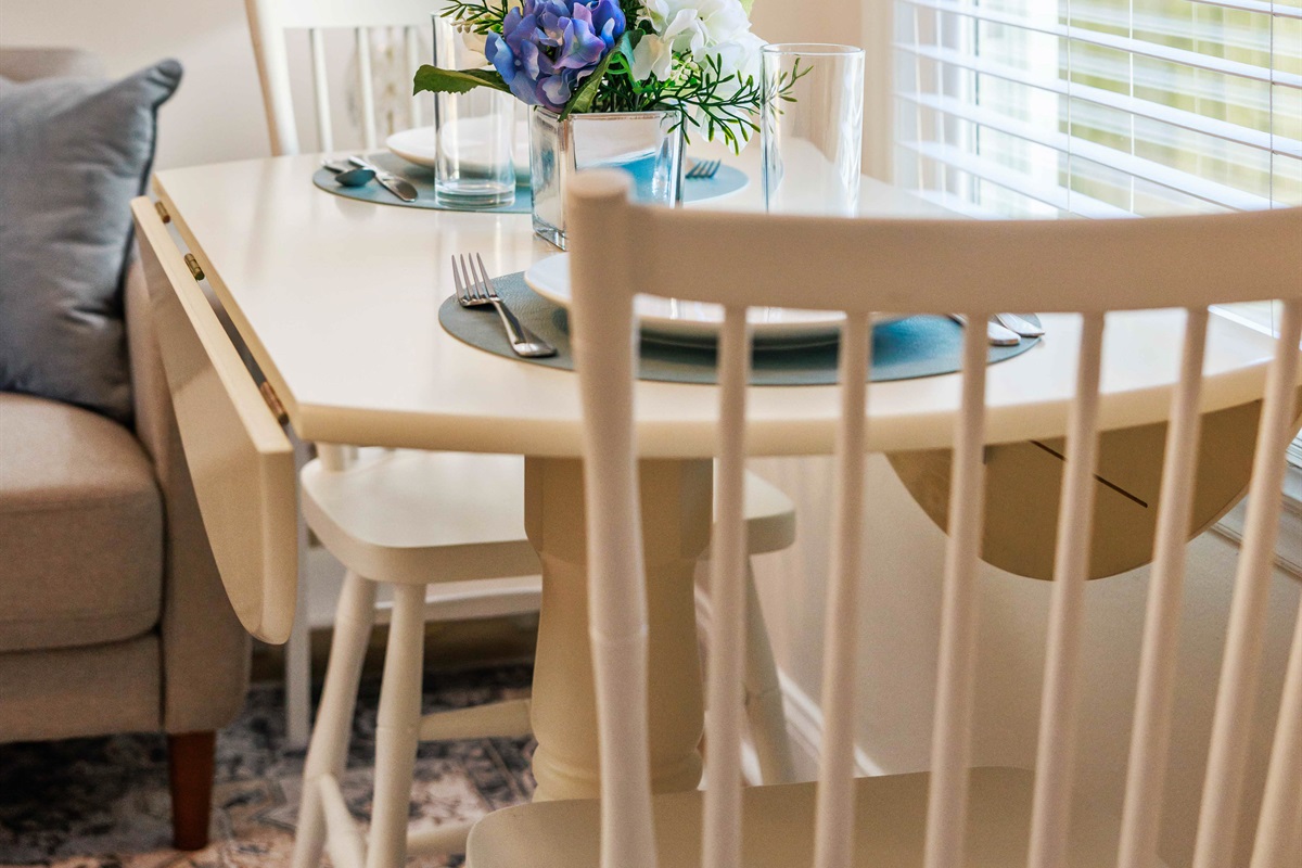 Dining table seats four