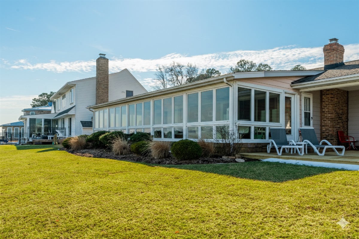 Sunroom Oasis: Enjoy peaceful views and sunshine in this bright, spacious retreat!