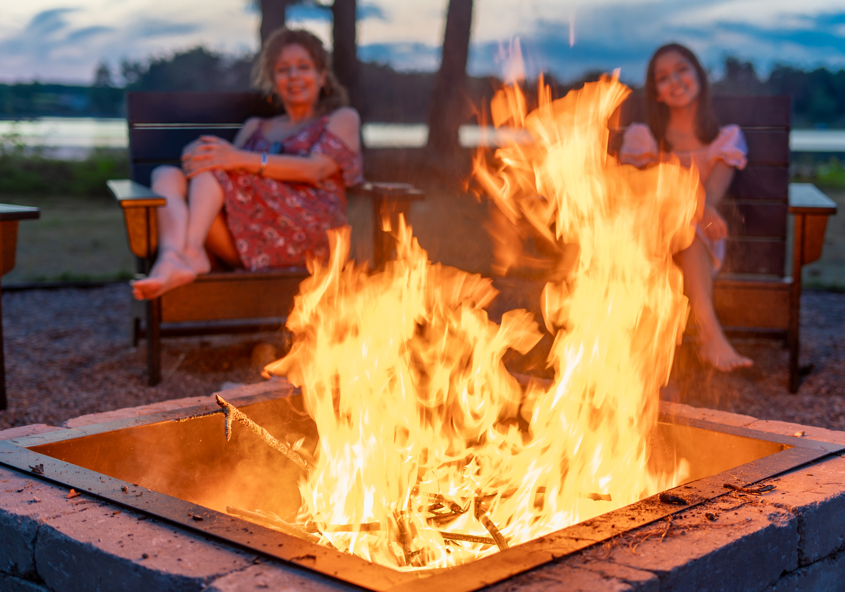 The firepit is lit, the lake is glowing, and everyone is exactly where they should be. Complimentary firewood included - every stay