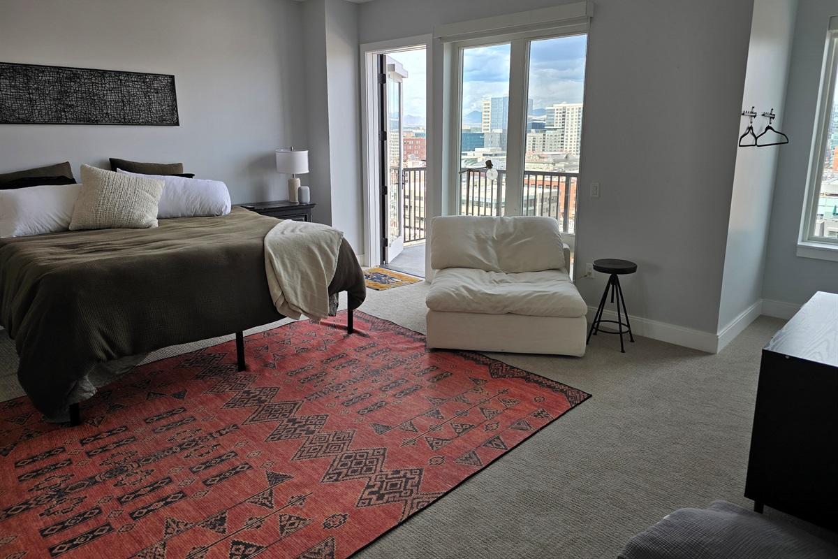 King size bed, extra seating area, private balcony with seating.