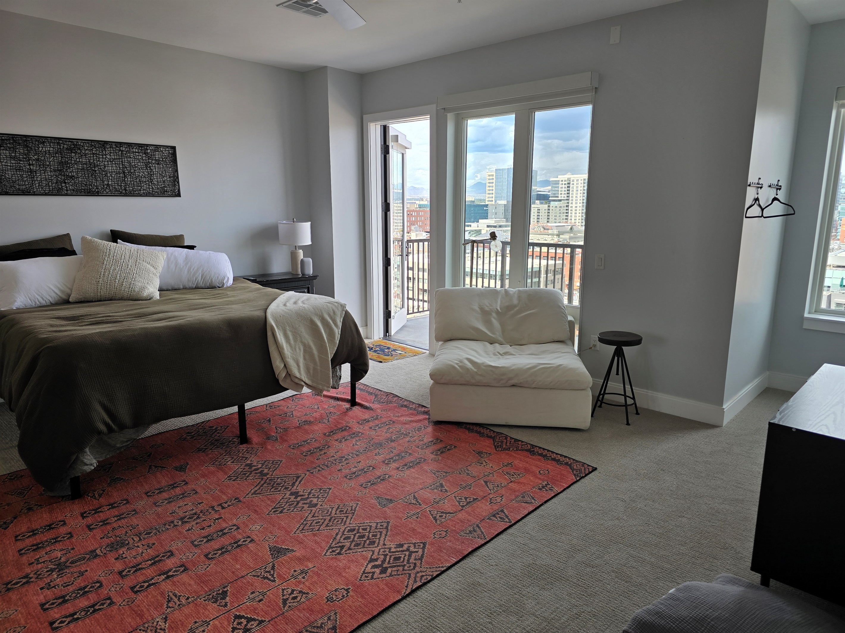 King size bed, extra seating area, private balcony with seating.