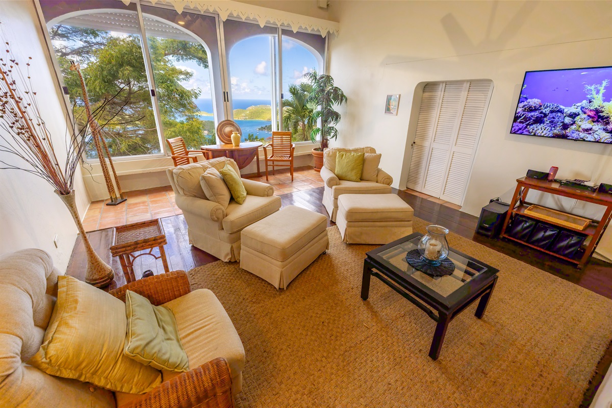 This living room is only steps down from the king bed