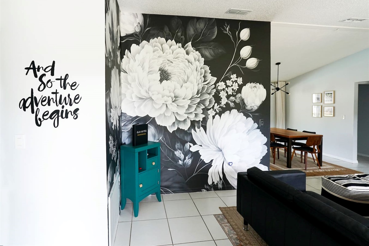 Welcome! And so the adventure begins!
Make your stay unforgettable at this Spring Hill Airbnb! Featuring floral wall mural upon entry #instagramWorthy #springhillairbnb #stylishstay