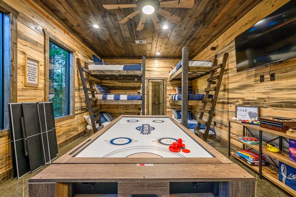 Modern bunk suite with soaring ceilings and endless indoor entertainment.