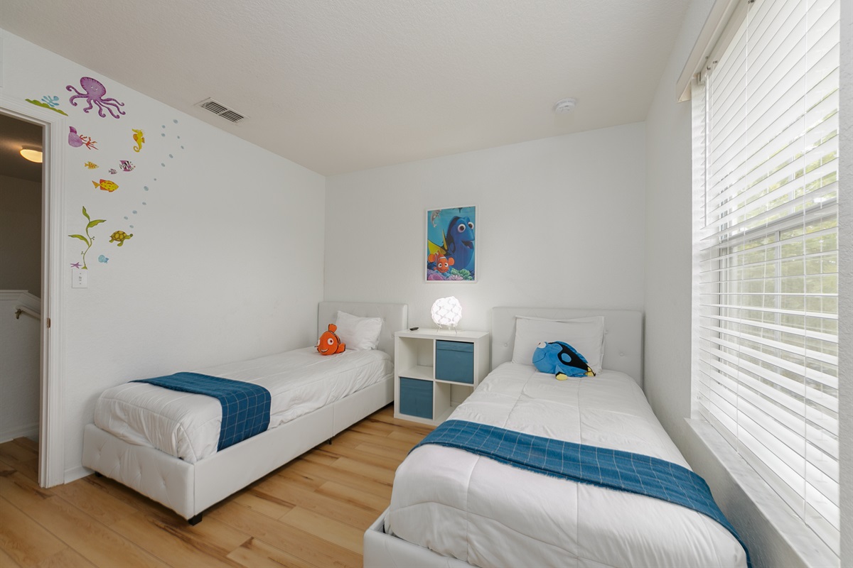 This is one of the two bedrooms with single beds