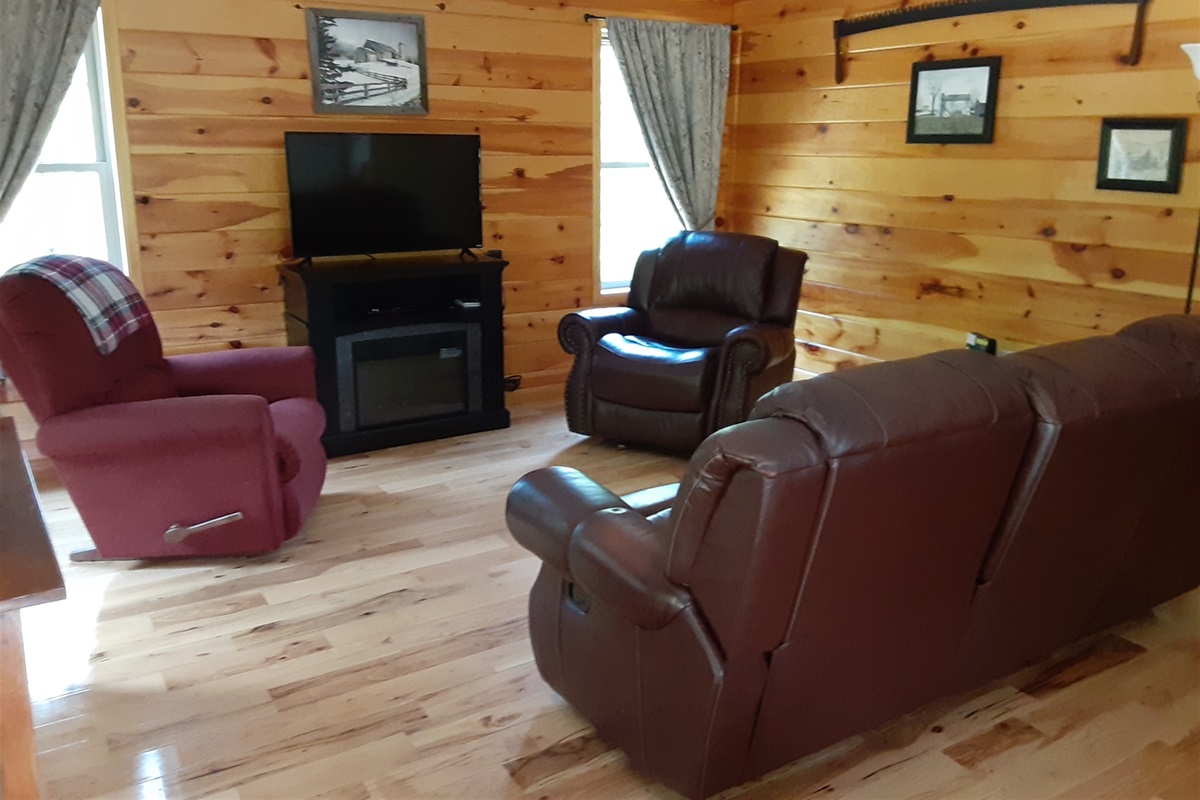 Comfortable seating provides plenty of space for your group to gather, whether you’re watching a movie, playing games, or simply unwinding by the soft glow of the evening.