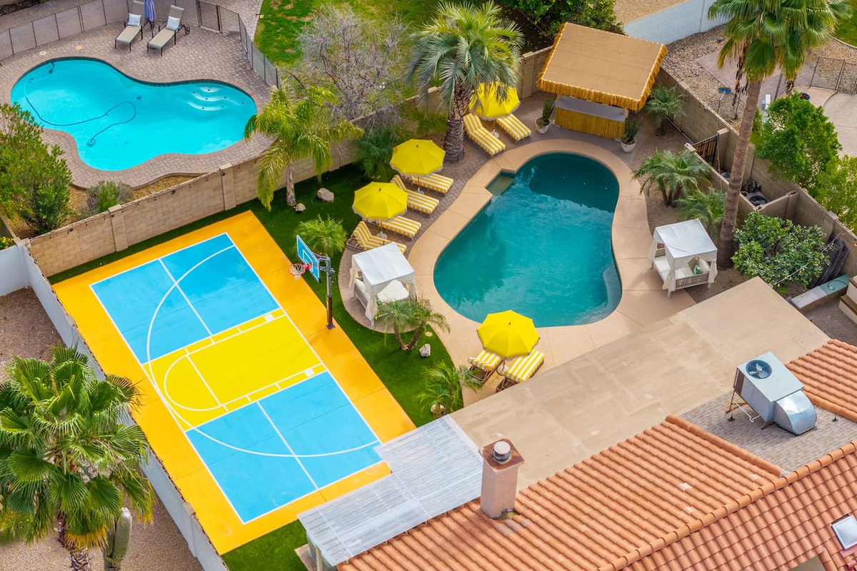Multiple pools and courts with loungers and umbrellas—ideal for families seeking endless recreation and relaxation options.