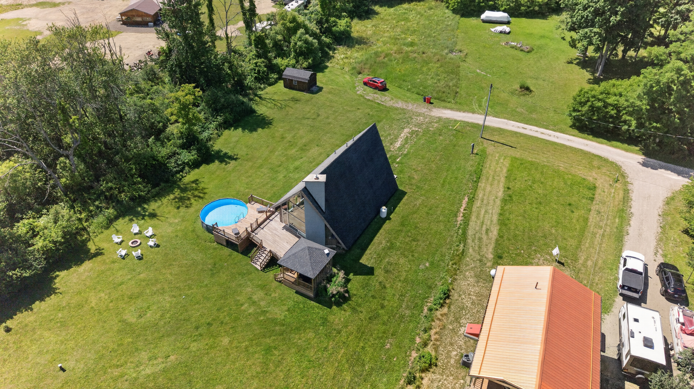 Aerial view showing the home and pool