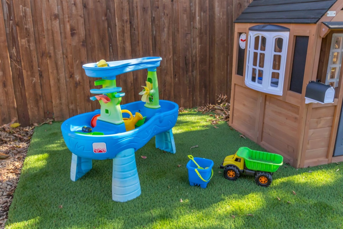 Interactive water-play station with toys included, giving kids a hands-on place to splash, build, and create their own backyard adventures.