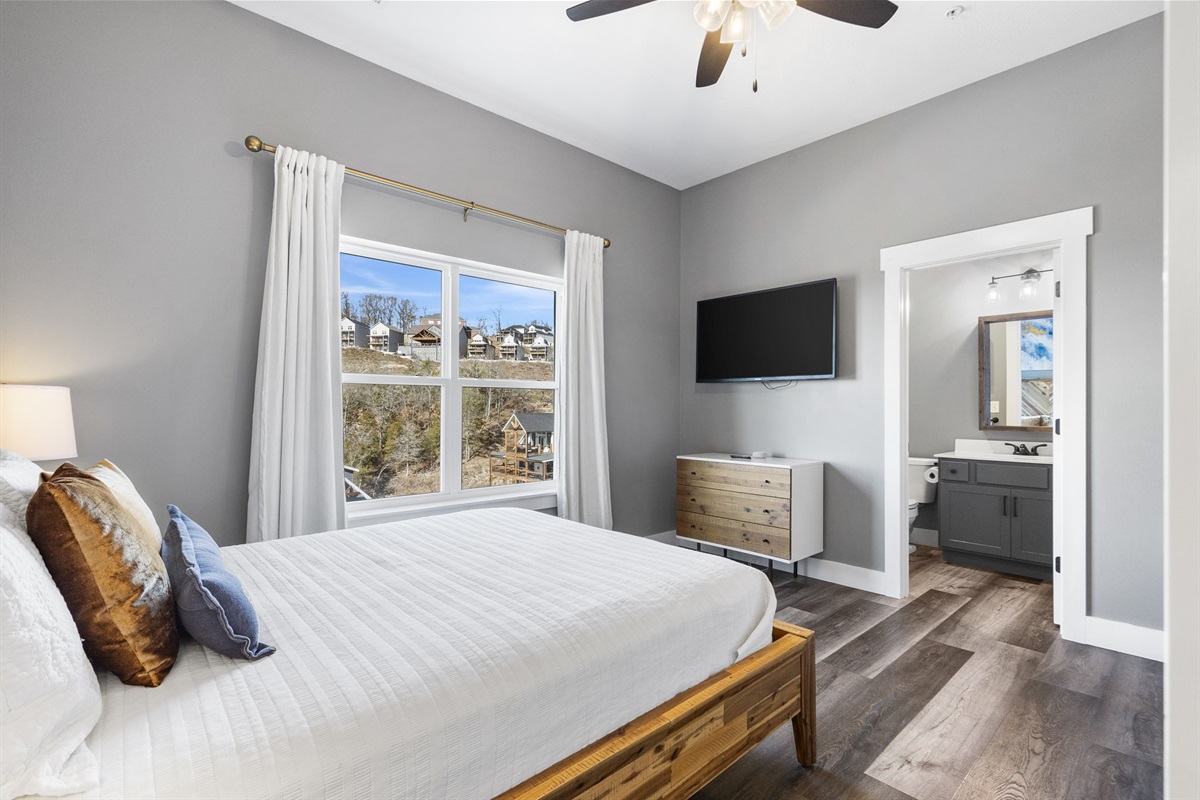 Lower level queen with bunk and attached bathroom