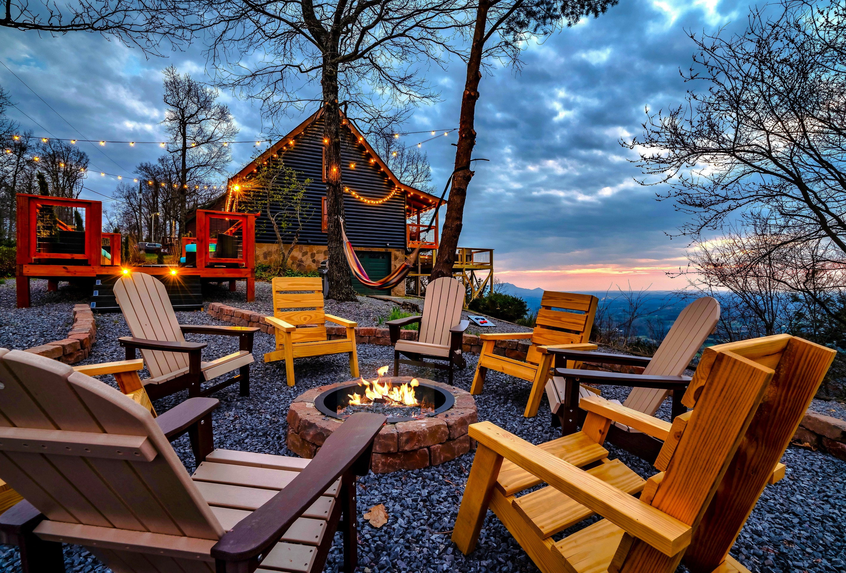 Mountains views, fire crackling, city lights stretching for miles, and a sunset you won’t forget. The only thing missing is you and your loved ones sitting together. Cabin's life at its best.