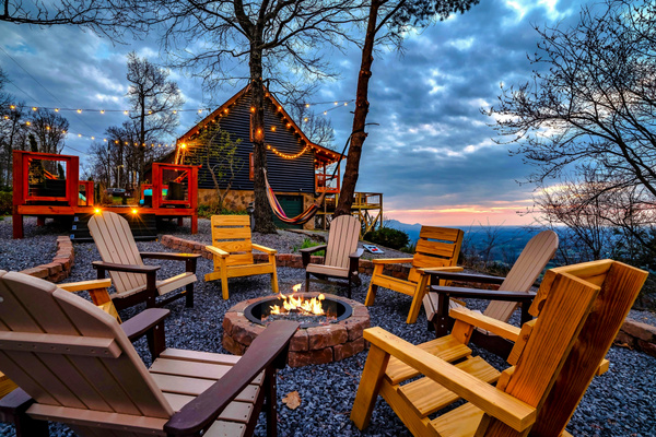 Mountains views, fire crackling, city lights stretching for miles, and a sunset you won’t forget. The only thing missing is you and your loved ones sitting together. Cabin's life at its best.