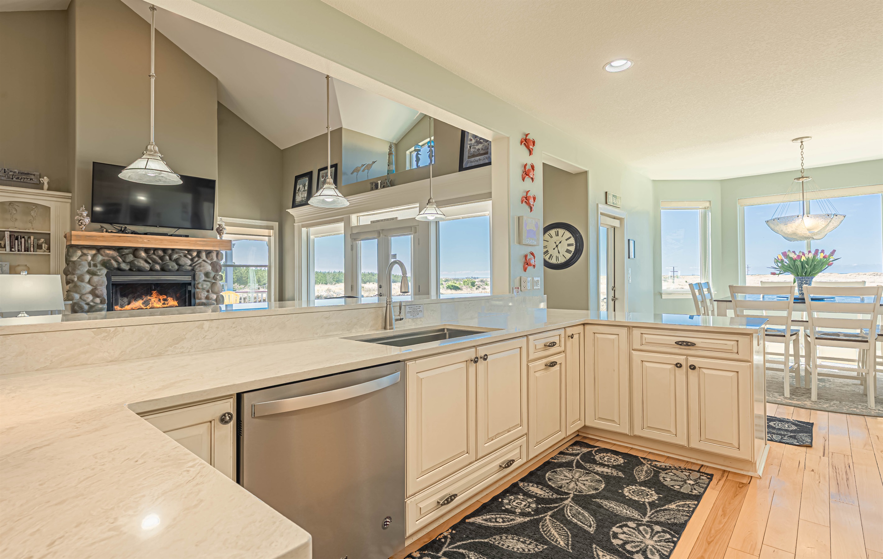 Kitchen looks out into the living room.