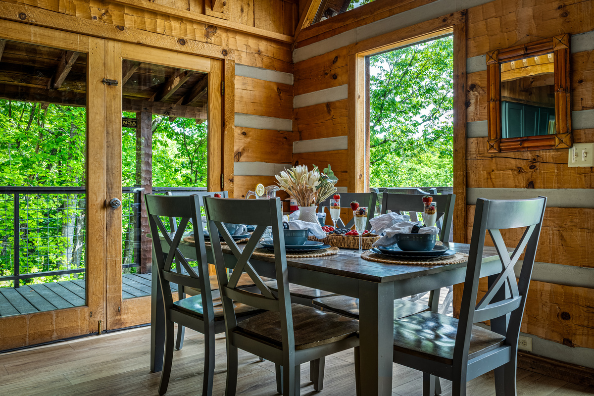 Dining area has a table and 6 chairs