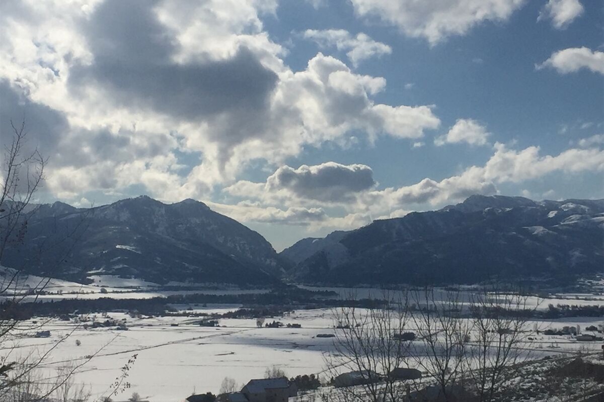 Snow-covered valley views in the heart of winter