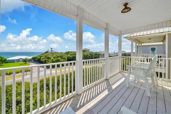 Soak in the gulf breezes and enjoy gorgeous sunsets from this private balcony off the third-floor primary suite