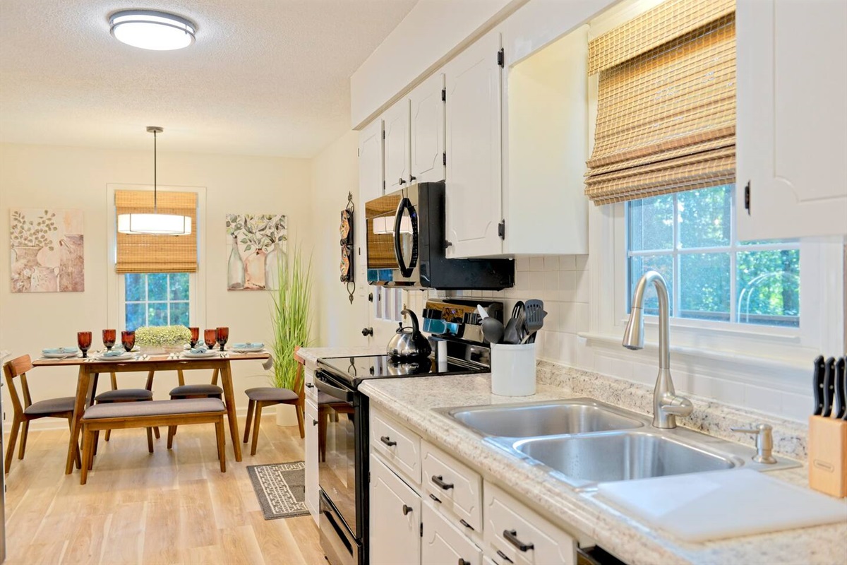 Host your family effortlessly from the kitchen with this open floor space!