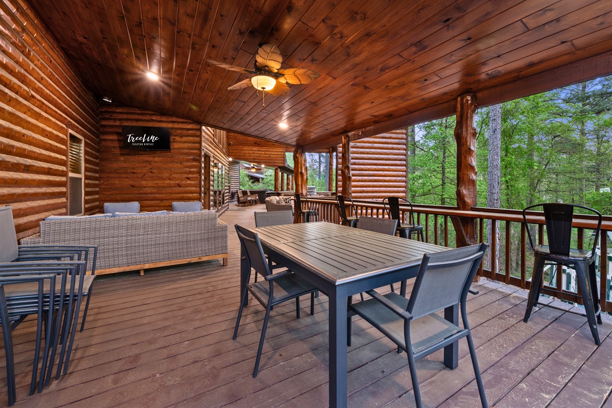 Outdoor dining is made easy with this spacious table, offering plenty of room for shared meals surrounded by fresh air and scenic views.