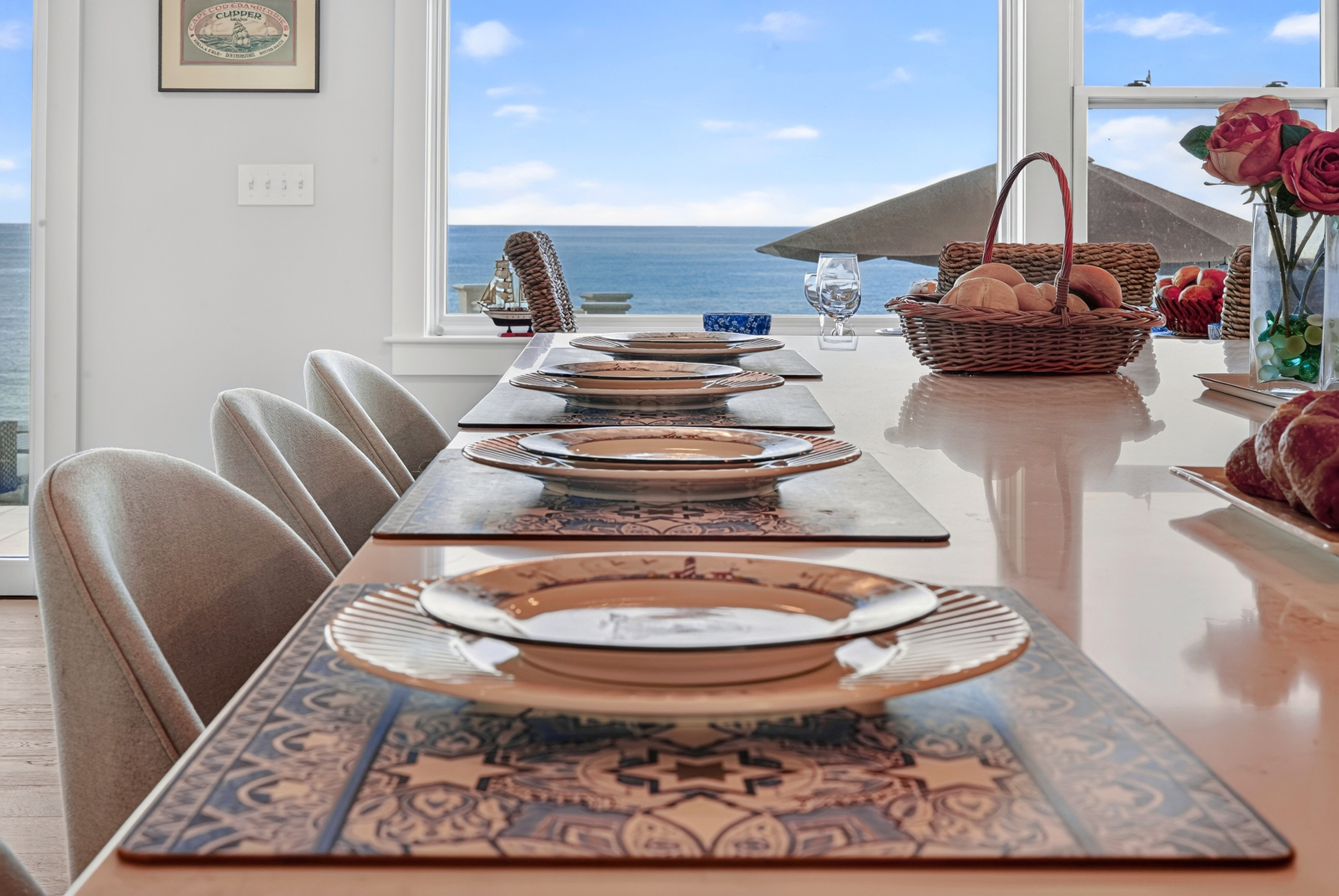 Expansive kitchen island overlooking the living area and beautiful ocean views
